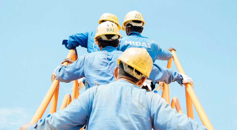 Factory Workers on External Stairs